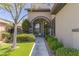 Inviting front entrance features manicured shrubs, rock landscaping, and seating area at 17 Winding Rd, Henderson, NV 89052