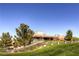 Exterior shot of Anthem Country Club featuring lush landscaping and desert plants at 17 Winding Rd, Henderson, NV 89052