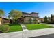Beautiful two-story home with a well-manicured front lawn at 17 Winding Rd, Henderson, NV 89052