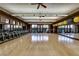 Well-lit gym with hardwood floors, stationary bikes, mirrored wall, and fitness balls at 17 Winding Rd, Henderson, NV 89052