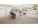 Spacious kitchen with sleek cabinets, stainless steel appliances, and center island with seating at 17 Winding Rd, Henderson, NV 89052
