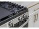 Close-up of a modern stainless steel range with integrated oven and gas cooktop controls at 17 Winding Rd, Henderson, NV 89052