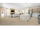 Open-concept kitchen featuring a marble island, stainless appliances, and seamless flow to living area at 17 Winding Rd, Henderson, NV 89052