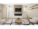 Comfortable living room with electric fireplace and contemporary decor at 17 Winding Rd, Henderson, NV 89052