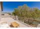Spacious patio featuring seating overlooking trees and neighborhood at 17 Winding Rd, Henderson, NV 89052