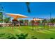 Inviting playground with swings and slides, offering a safe and enjoyable space for children to play at 17 Winding Rd, Henderson, NV 89052