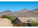 View of the mountains and rooftops from the patio at 17 Winding Rd, Henderson, NV 89052