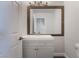 Updated bathroom with a vanity and large mirror at 2257 Loring Ave, Henderson, NV 89074