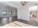 Bright dining room with hardwood floors and views into the living room and kitchen at 2257 Loring Ave, Henderson, NV 89074