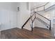 Grand entryway with hardwood floors and a stunning staircase at 2257 Loring Ave, Henderson, NV 89074