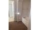 Bathroom with a separate soaking tub and shower behind a glass enclosure at 6140 Natural Slope St, Las Vegas, NV 89148