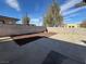 Backyard with gravel and block wall at 132 W Victory Rd, Henderson, NV 89015