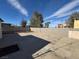 Large backyard with block wall and gravel at 132 W Victory Rd, Henderson, NV 89015