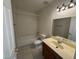 Bathroom with tub, toilet and vanity at 132 W Victory Rd, Henderson, NV 89015