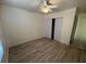 Bedroom with wood-look flooring and a ceiling fan at 132 W Victory Rd, Henderson, NV 89015