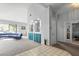 Bright entryway with teal cabinets and a view into the living area at 2761 Cape Hope Way, Las Vegas, NV 89121