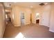 Large bedroom with carpet, laundry access and adjacent bathroom at 9408 Forest Edge Ave, Las Vegas, NV 89149