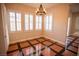 Bright breakfast nook with tile floor and plantation shutters at 9408 Forest Edge Ave, Las Vegas, NV 89149