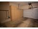 Garage interior with built-in storage cabinets at 9408 Forest Edge Ave, Las Vegas, NV 89149