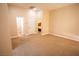 Spacious hallway with carpet flooring and access to bedrooms and bath at 9408 Forest Edge Ave, Las Vegas, NV 89149