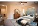 Main bedroom with upholstered bed and wood dresser at 9408 Forest Edge Ave, Las Vegas, NV 89149