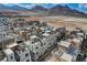 Aerial view of a community with modern townhouses and mountain views at 651 Sentinel Spire St, Las Vegas, NV 89138