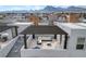 Aerial view of modern rooftop deck with pergola and furniture at 651 Sentinel Spire St, Las Vegas, NV 89138