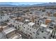 Aerial view of modern townhouses with rooftop decks and distant city views at 651 Sentinel Spire St, Las Vegas, NV 89138