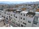 Aerial view of community showing multiple homes with rooftop decks at 651 Sentinel Spire St, Las Vegas, NV 89138