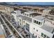 Aerial view of modern townhouses with rooftop decks and mountain views at 651 Sentinel Spire St, Las Vegas, NV 89138