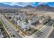 Aerial view of townhome community near mountains and roads at 651 Sentinel Spire St, Las Vegas, NV 89138