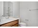 Simple bathroom with wood vanity and single sink at 651 Sentinel Spire St, Las Vegas, NV 89138