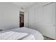 Well-lit bedroom with access to laundry and extra closet space at 651 Sentinel Spire St, Las Vegas, NV 89138