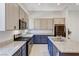 Modern kitchen with two-toned cabinets and a large kitchen island at 651 Sentinel Spire St, Las Vegas, NV 89138