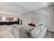 Open living room with a view of the kitchen and a comfortable sectional sofa at 651 Sentinel Spire St, Las Vegas, NV 89138