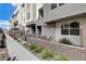 Private patio with table and chairs, adjacent to a walkway at 651 Sentinel Spire St, Las Vegas, NV 89138