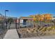 Gated community pool with adjacent construction at 651 Sentinel Spire St, Las Vegas, NV 89138