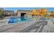 Community pool with a block building and surrounding landscaping at 651 Sentinel Spire St, Las Vegas, NV 89138