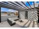 Spacious rooftop deck with pergola, sectional sofa, and city views at 651 Sentinel Spire St, Las Vegas, NV 89138