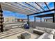 Relaxing rooftop deck with pergola, seating area, and city views at 651 Sentinel Spire St, Las Vegas, NV 89138