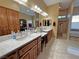 Well-lit bathroom features double sinks, extensive countertop space, and a full-sized shower at 1120 W Gray Fox Way, Pahrump, NV 89048