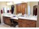 Bathroom featuring double sinks, ample counter space, and cabinetry for storage at 1120 W Gray Fox Way, Pahrump, NV 89048