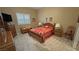 Cozy bedroom with neutral walls, a traditional wooden bed frame, and coordinated furnishings at 1120 W Gray Fox Way, Pahrump, NV 89048