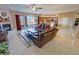 Living room features a fireplace, with backyard access through sliding glass doors, and flows into the kitchen at 1120 W Gray Fox Way, Pahrump, NV 89048