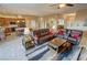 Spacious living room featuring comfortable seating, stylish décor, and an open floor plan at 1120 W Gray Fox Way, Pahrump, NV 89048
