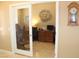 Well-lit office space with glass door, featuring a functional desk, chair, and office decor at 1120 W Gray Fox Way, Pahrump, NV 89048
