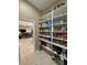 Walk-in pantry with shelving fully stocked with food and supplies at 1120 W Gray Fox Way, Pahrump, NV 89048