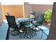 Covered patio with a fire pit and comfortable seating, perfect for outdoor entertaining at 1120 W Gray Fox Way, Pahrump, NV 89048