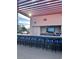 Outdoor kitchen and bar with seating for residents at 200 W Sahara Ave # 1609, Las Vegas, NV 89102