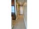 Bright hallway with tile flooring and neutral walls at 200 W Sahara Ave # 1609, Las Vegas, NV 89102